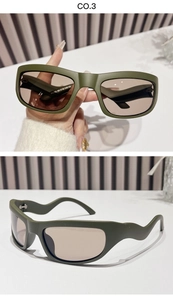 Detail of olive green Y2K sporty sunglasses with wave temples and brown lenses