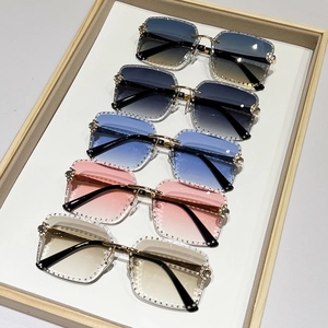 Frameless square sunglasses with rhinestone diamond accents in various gradient colors