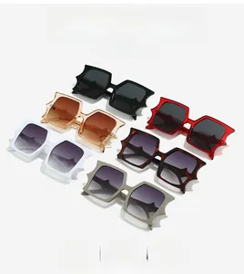 Detail showing various color options of rectangular sunglasses with zigzag frame design