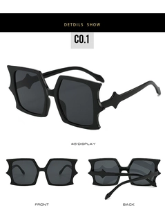 Detailed views of black oversized geometric sunglasses with unique star-accented frames