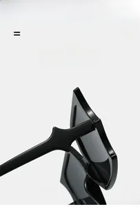 Detail of high-quality hinges and flexible resin frame on oversized square sunglasses