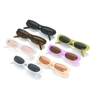 Set of six colorful narrow cat-eye sunglasses with vintage Y2K oval plastic frames