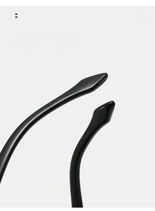 Close-up of curved mirror legs on square sunglasses with a polished black finish