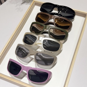 Y2K futuristic sports sunglasses set in black, silver, and olive for cycling and driving