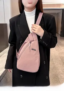 Pink nylon crossbody chest bag with adjustable strap and LSNR label for outdoor use