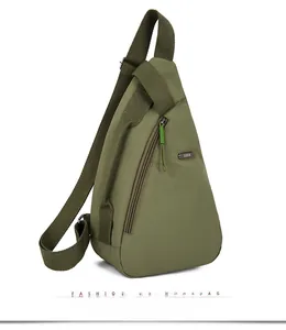 Detail view of military green nylon chest bag with LSNR brand plaque and vertical zip