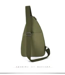 Back view of army green nylon chest bag featuring adjustable wide fabric shoulder strap