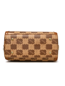 Detail view of handbag base with golden protective studs and monogrammed brown texture