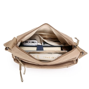 Khaki multi-pocket nylon crossbody bag with large capacity and layered zip design
