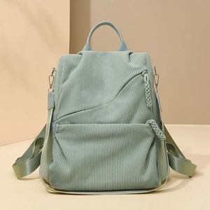 Sage green corduroy backpack for women with minimalist design and leather handle
