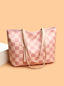 Detail view of pink PU tote bag with bear-paw pattern and elegant shoulder straps