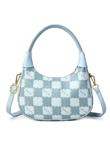 Detail of light blue checkered hobo bag with gold hardware and adjustable strap