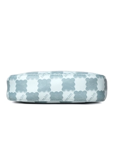 Close-up of light blue synthetic leather handbag featuring wave square pattern and kmjm print