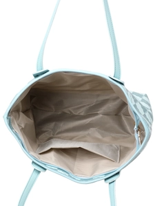 Detail view of large capacity tote bag interior with chevron lining and zip pocket