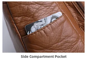 Detail shot of the side compartment pocket on a brown lychee textured PU leather bag