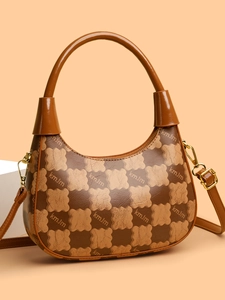 Detail of hobo crossbody bag with kmJm monogram pattern and gold metal hardware