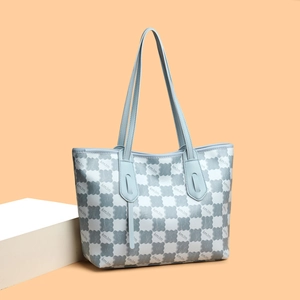 Large capacity tote bag with blue checkerboard pattern and KMJM print on pink background