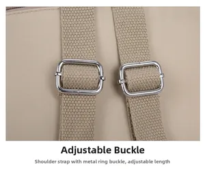 Close-up of adjustable silver metal buckles on beige nylon straps for backpacks