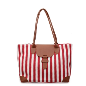 Red and white striped canvas tote bag with brown leather handles and buckle detail