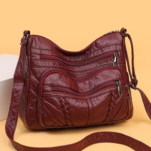 Fashionable dark red PU leather crossbody tote bag with multi-pocket design and woven texture