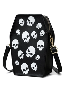 Detail of gothic coffin-shaped crossbody bag with white skull prints and gold hardware