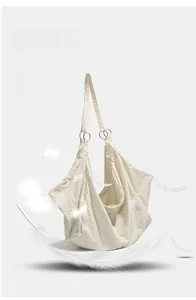 Lightweight minimalist shoulder bag with fine twill texture and floating feathers