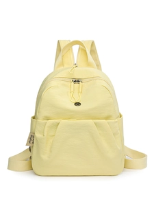 Wasserfester hellgelber Nylon Rucksack für Damen mit mehreren Taschen und Tragegriff
