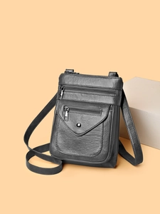 Dark gray faux leather crossbody phone bag with multi-zipper pockets and silver hardware