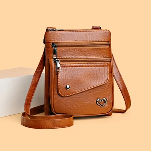Brown vintage faux leather crossbody phone bag with multiple zippers and heart charm