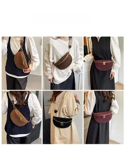 Detail view of crescent waist bags in three colors with ethnic jacquard straps and gold zippers