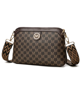 Detail of vintage brown crossbody bag featuring M-pattern print and wide jacquard strap