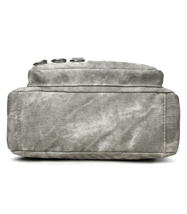 Detailed bottom view of large grey canvas crossbody bag with reinforced stitching and zippers