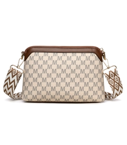 Detail view of vintage printed crossbody bag with wide patterned shoulder strap