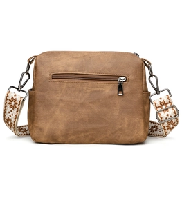 Detailed back view of brown vintage bag featuring smooth leather texture and zip pocket