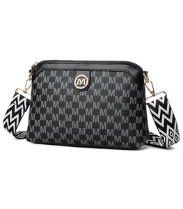 Detail of vintage crossbody bag with grey monogram pattern and wave-pattern wide strap