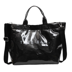 Large capacity black patent leather tote bag with white lettering and adjustable strap