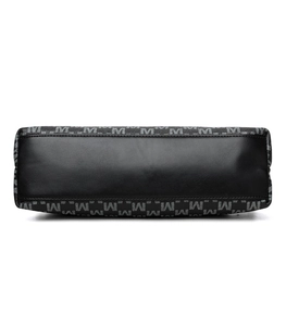 Detail view of the flat bottom and M-letter jacquard pattern on this black shoulder bag