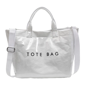 White glossy tote bag with black text print featuring adjustable shoulder straps and handles
