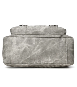 Close-up of gray crossbody bag with textured twill fabric and reinforced bottom stitching