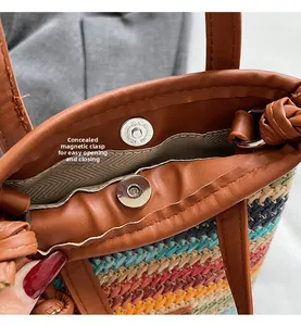 Detail of internal invisible magnetic closure and herringbone lining of woven tote bag
