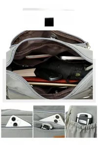 Detail showing internal capacity and multi-pocket storage of light grey nylon bag