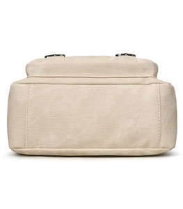 Detail view of the stable rectangular base and neat stitching of the beige crossbody bag