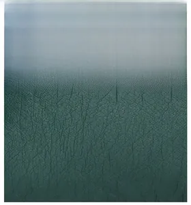 Close-up of flexible and wear-resistant green pebble grain faux leather material