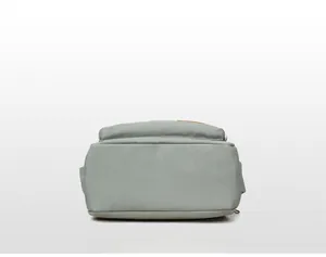 Flat bottom structure and precise stitching of the large green canvas shoulder bag