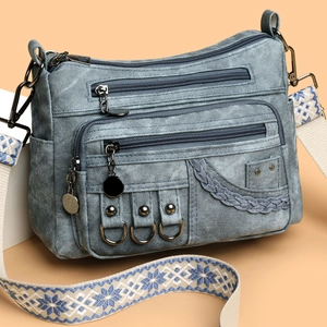 Light blue denim crossbody bag with multi-pockets and embroidered wide strap