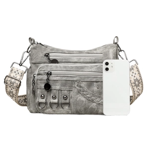 Elegant multi-pocket grey crossbody bag with stylish geometric pattern woven shoulder strap