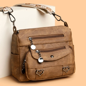 Brown vintage faux leather crossbody bag with multiple pockets and jacquard strap