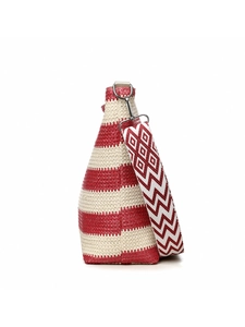 Detail of red and white woven shoulder bag with ethnic geometric patterned wide strap