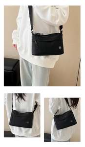 Detailed views of a black water-resistant nylon crossbody bag with multiple compartments