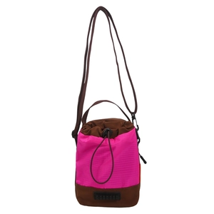 Japanese style pink checkered nylon drawstring crossbody bag with brown trim and strap